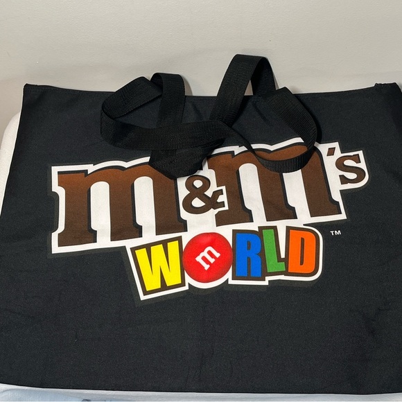 M&M's World graphic tote bag featuring several M&M's characters. - Picture 2 of 9